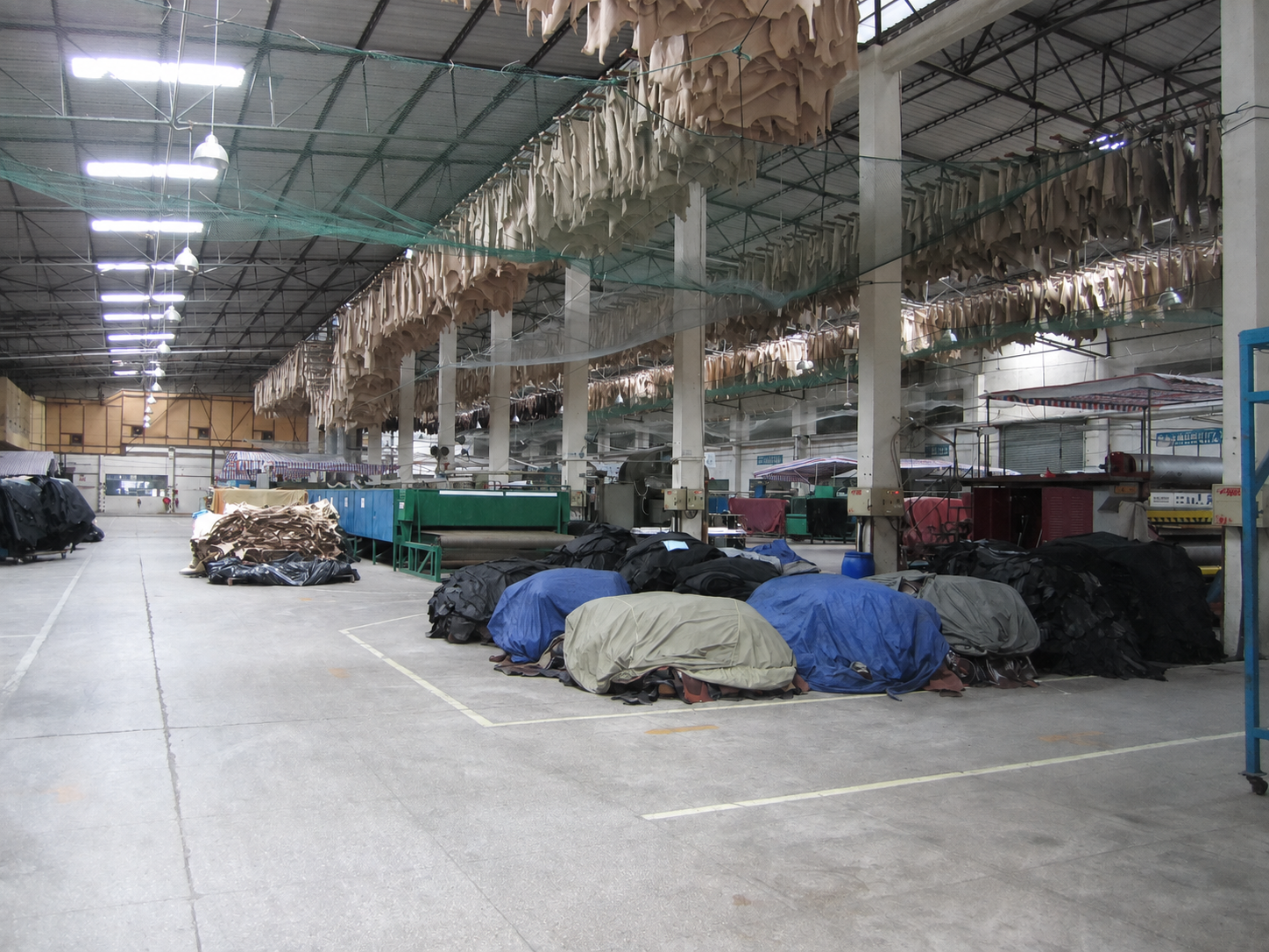 GALUX leather workshop with hides and production equipment